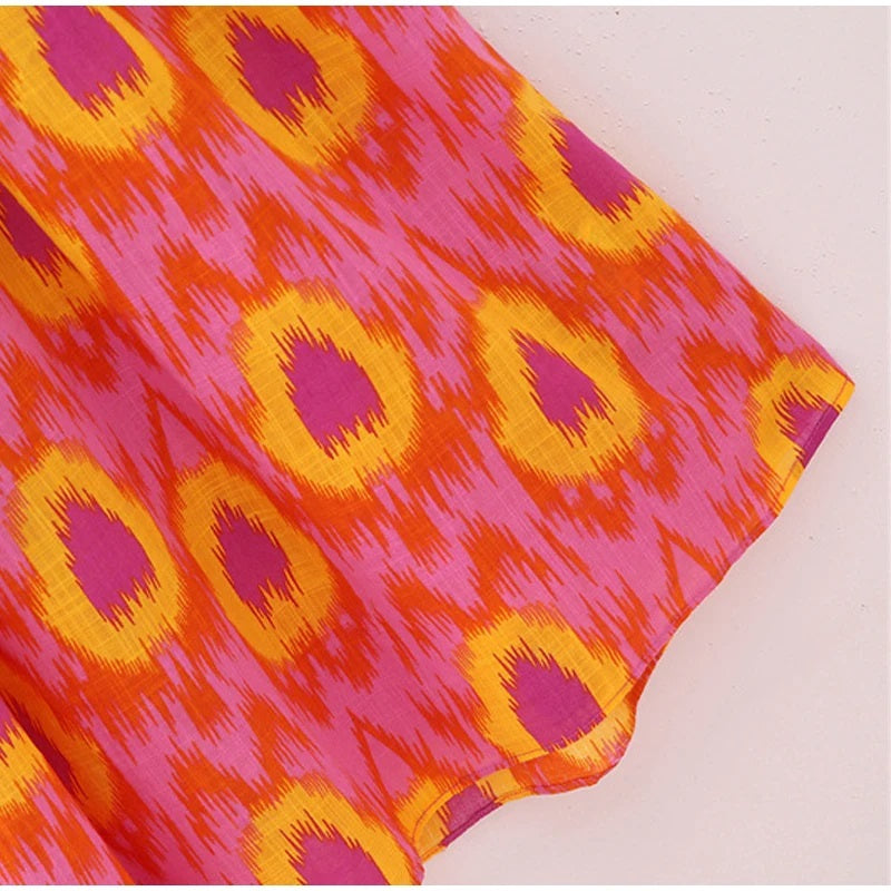 Robe de plage orange ensoleillée avec épaules décolletées élégantes par Octavia