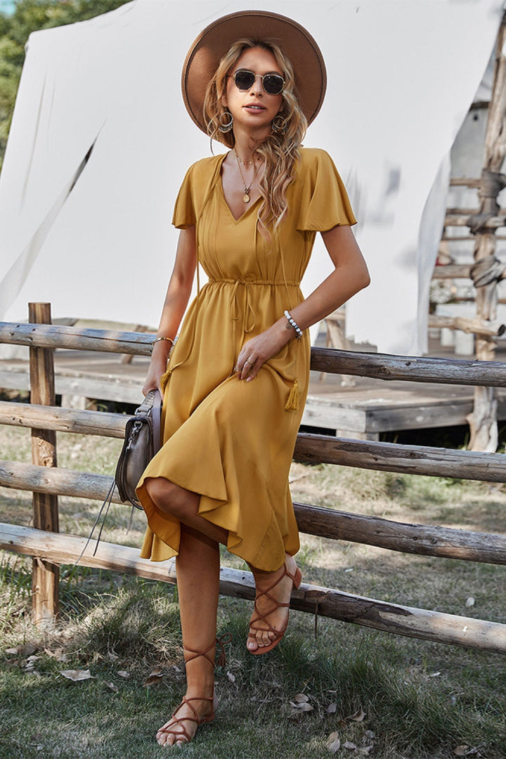 Chloe - Charmante robe midi avec col en V et ceinture élégante pour femmes